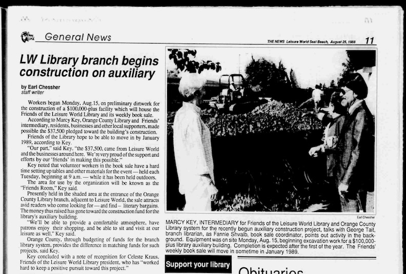 Newspaper, photo of ground breaking for Friends of Library building.